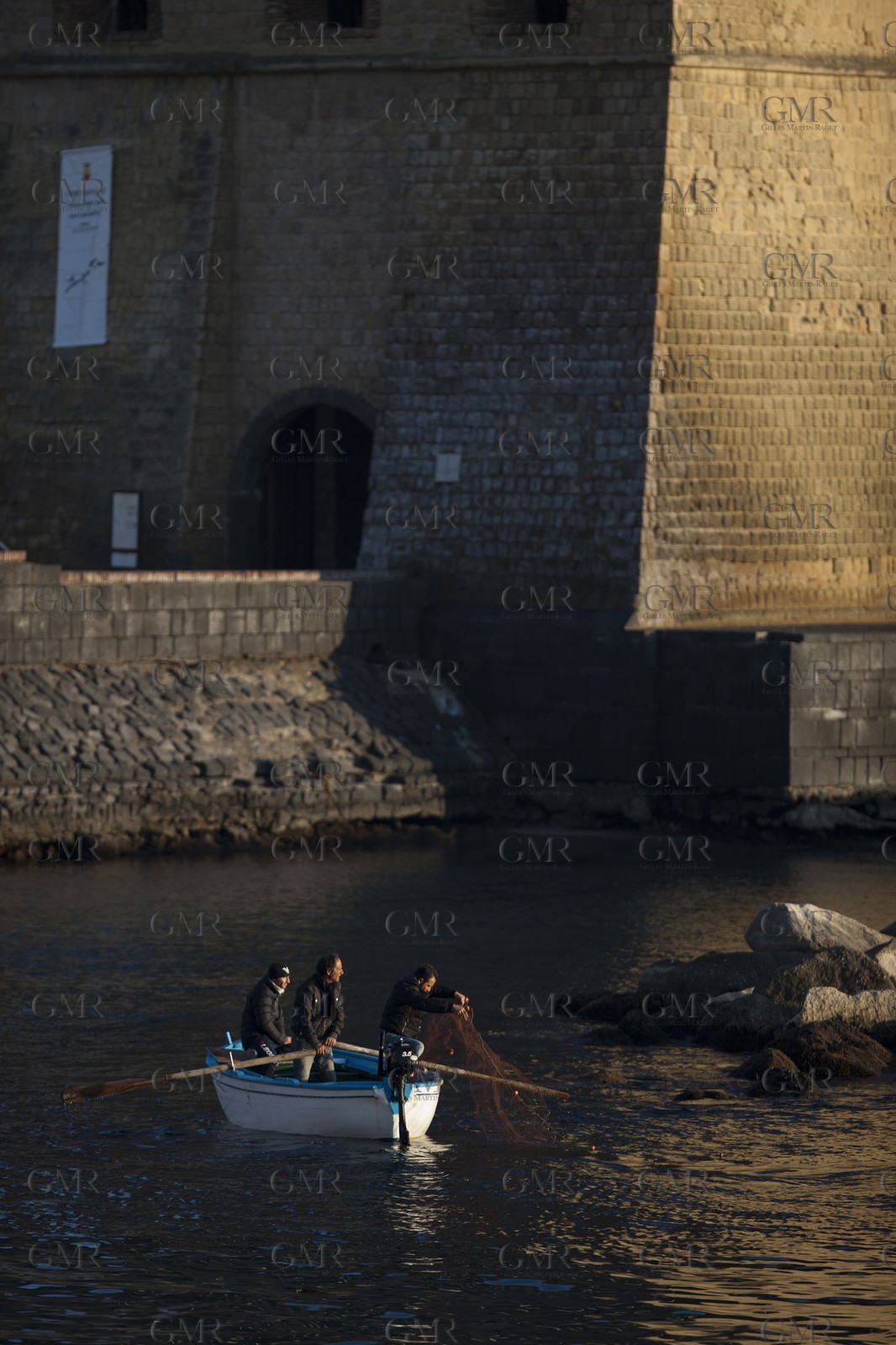 24 02 2012 - Naples (ITA) - 34th America's Cup - America's Cup World Series Naples 2012 - Naples Preview - Fishermen at Castel Dell Ovo