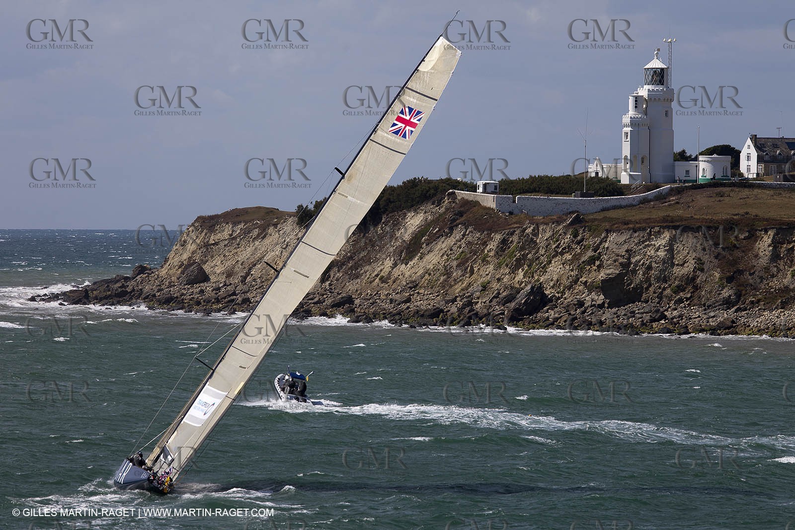 05 08 2010 - Cowes (UK, IOW) - The 1851 Cup -  BMW ORACLE Racing -  - Round The Island Race - Passing Ste Catherine Lighthouse.