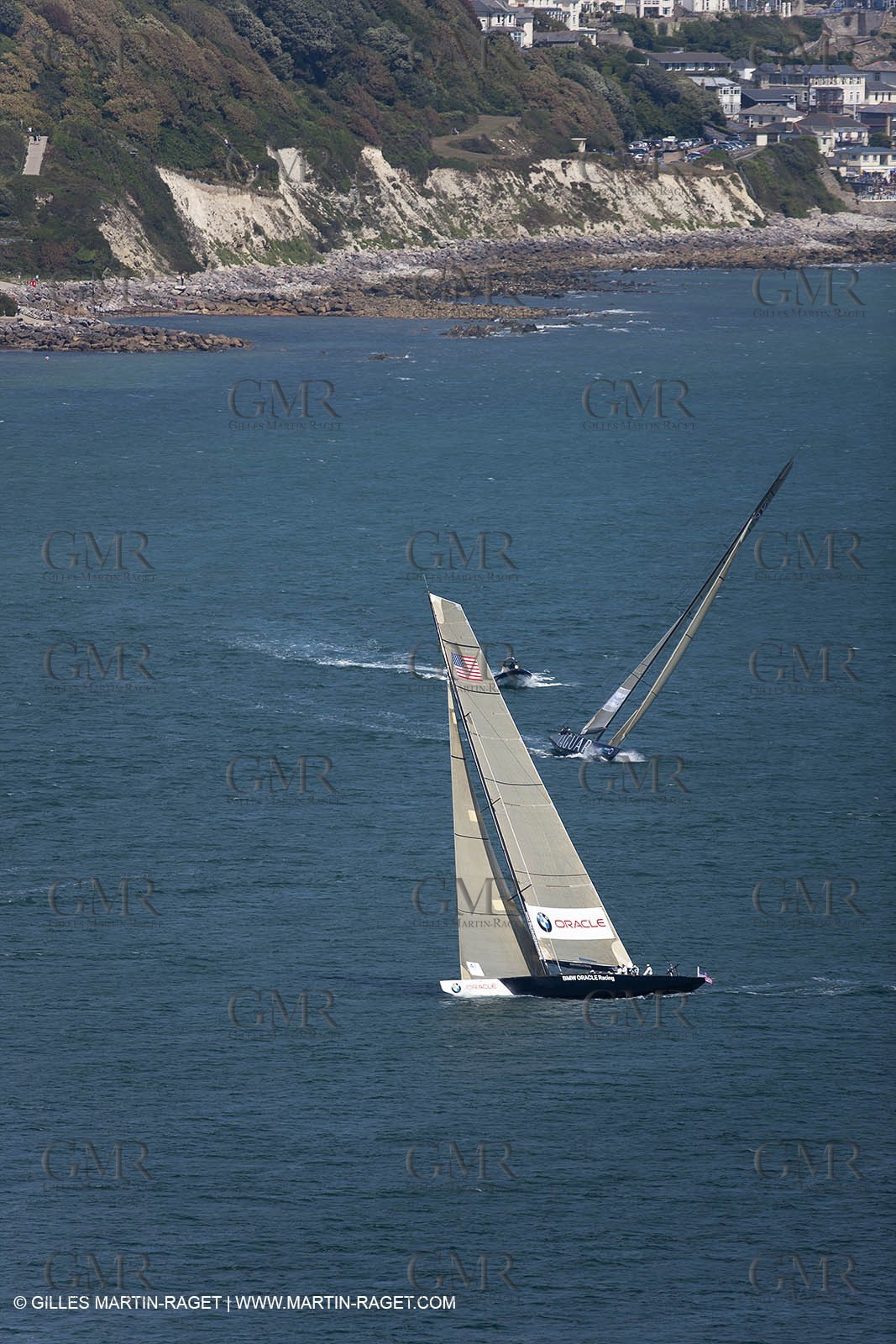 05 08 2010 - Cowes (UK, IOW) - The 1851 Cup -  BMW ORACLE Racing -  - Round The Island Race - Passing Ste Catherine Lighthouse.