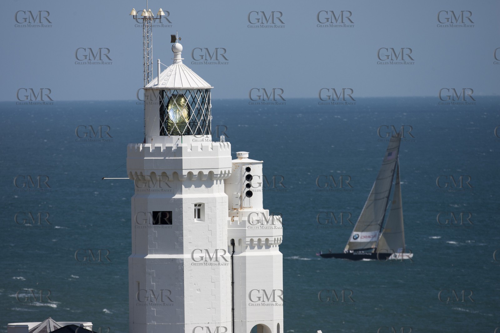 05 08 2010 - Cowes (UK, IOW) - The 1851 Cup -  BMW ORACLE Racing -  - Round The Island Race - Passing Ste Catherine Lighthouse.