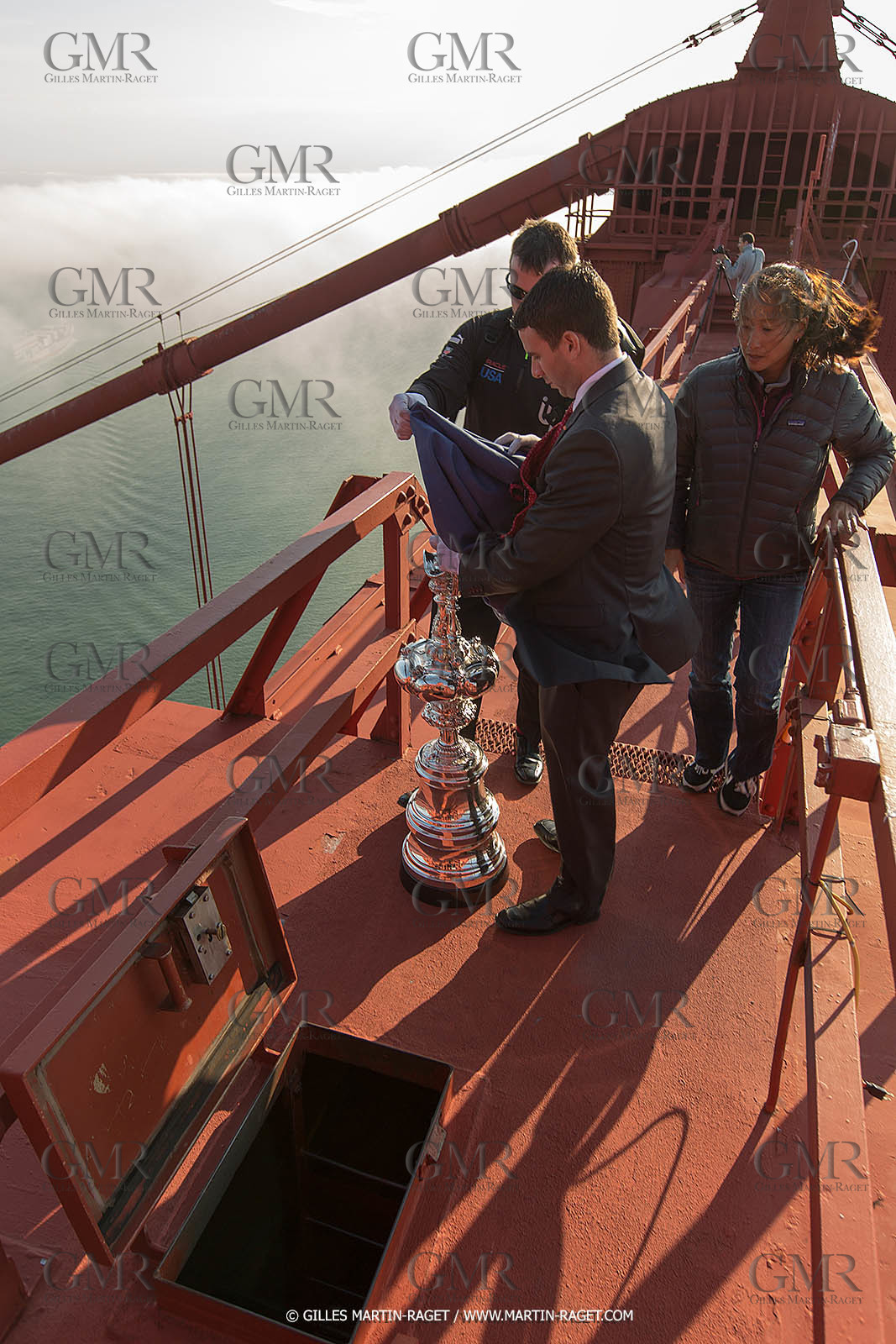 03 07 2013 - San Francisco (USA, CA) - 34th America's Cup - The America's Cup Trophy at the top of Golden Gate Bridge