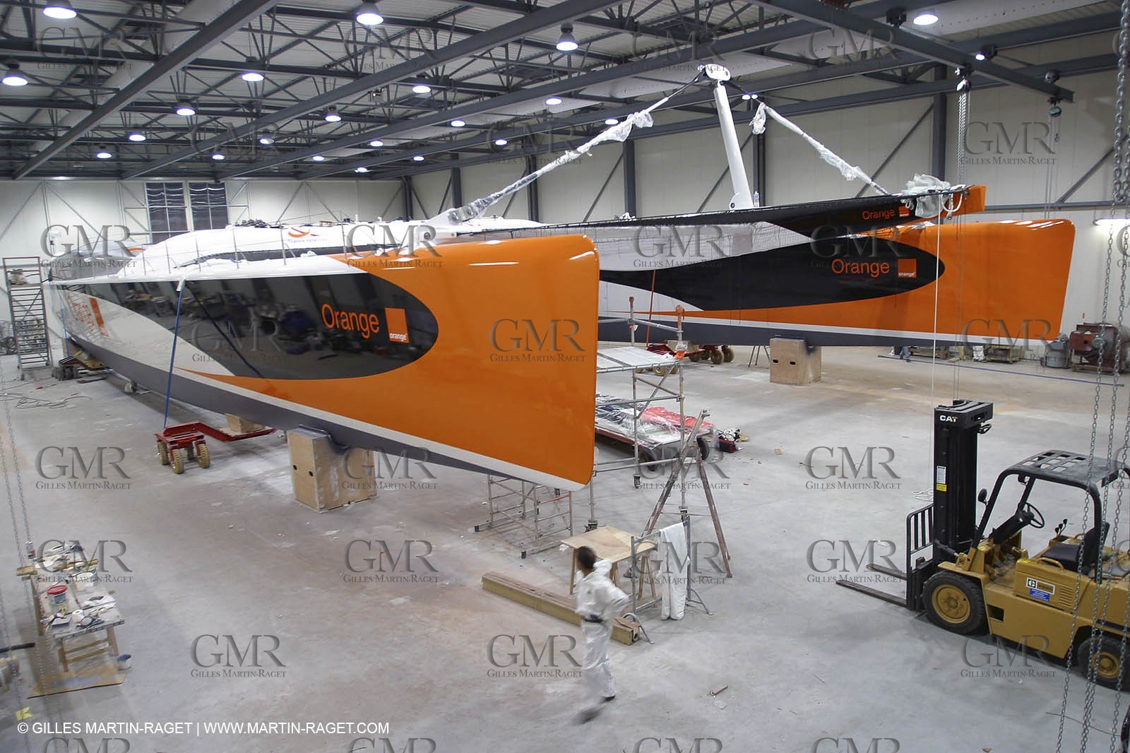 Vannes - Multiplast Boatyard - Orange II going out of the shed