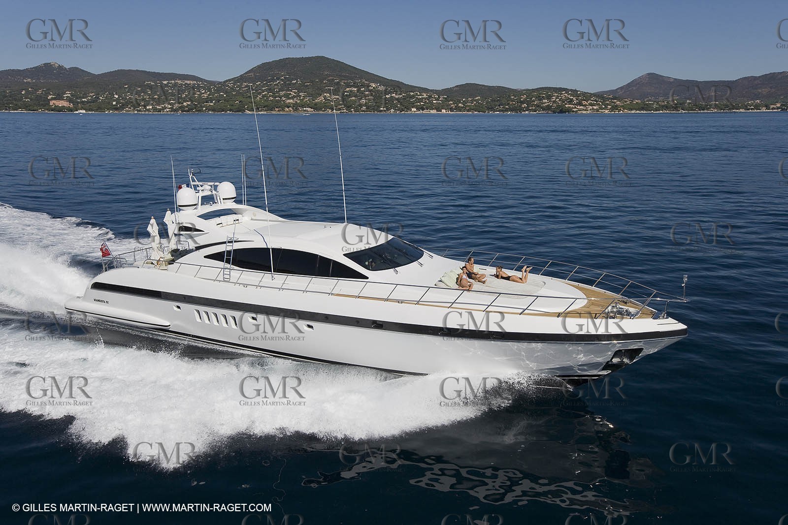 06 09 2007 - Saint Tropez (FRA, 83) - Superyachts - Motoryachts - Mangusta 92 Triple Fun in Saint Tropez - Mooring at Club 55 at Pampelonne Beach