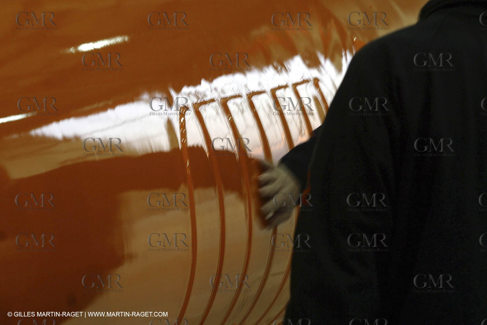 Vannes - Multiplast Boatyard - Orange II going out of the shed