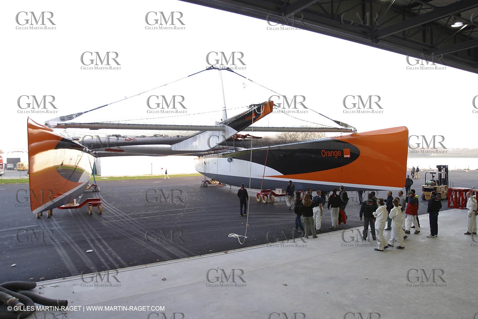 Vannes - Multiplast Boatyard - Orange II going out of the shed