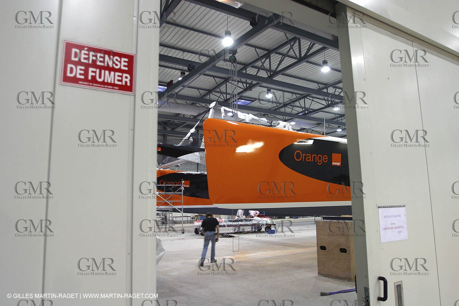 Vannes - Multiplast Boatyard - Orange II going out of the shed